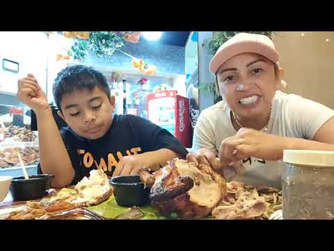 eating lechon manoka with christiano